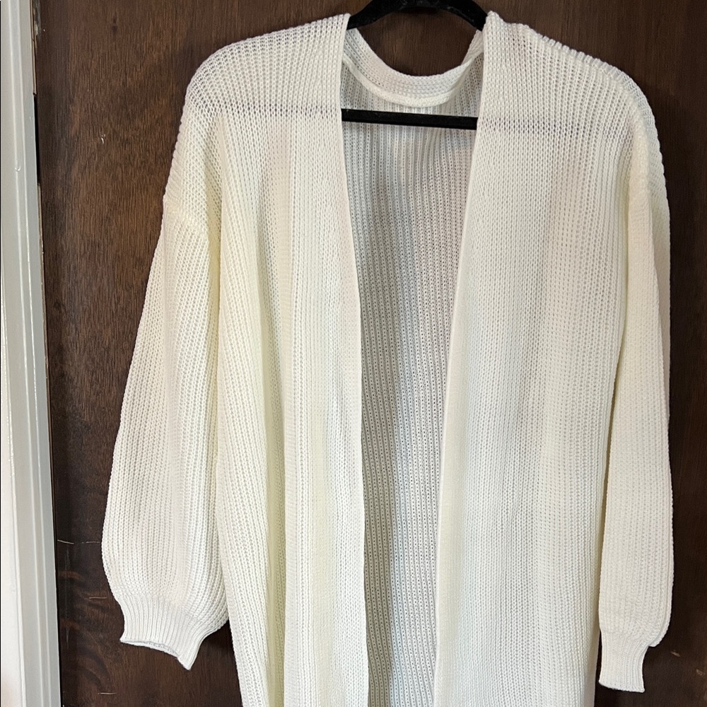 Ladies lite weight sweater. New without tags. Size medium